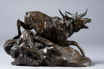 BARYE Antoine Louis, 1796-1875 
Élan surpris par un lynx
Groupe en bronze à patine...