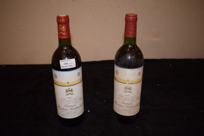 null 2 bouteilles CH. MOUTON-ROTHSCHILD, 1° cru Pessac-Léognan 1983 (1 J elt) 

