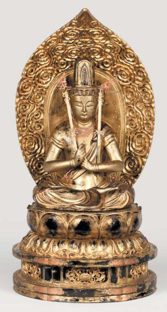 ASIE Important sujet en bois laqué et doré représentant la déesse Kannon assise en...