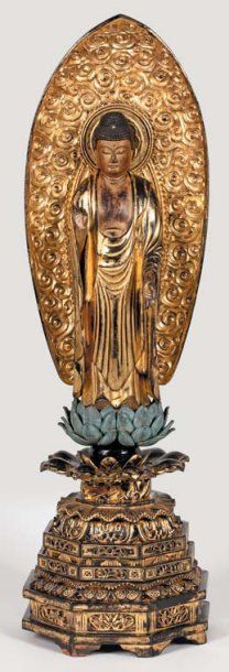 ASIE Important sujet en bois laqué et doré représentant le Bouddha debout sur un...