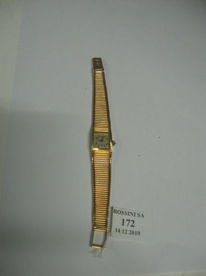 Anonyme années 50. Montre bracelet de dame en or jaune 18K (750/1000e). Cadran argenté....