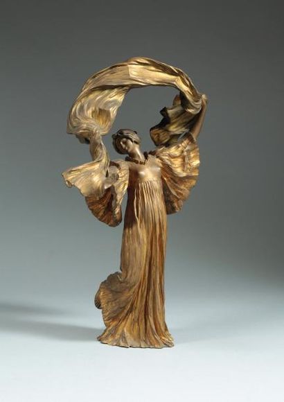 LÉONARD Agathon, 1841-1923 La danse à l'écharpe
Bronze à patine dorée Susse Frères...