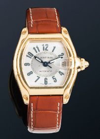 null Montre bracelet d'homme automatique à boitier tonneau en or jaune 18K (750)...