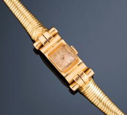 null Montre bracelet mécanique de dame à boitier rectangulaire en or jaune 18K (750)...