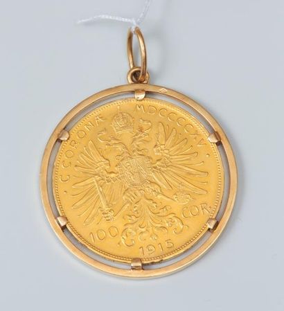 null Pièce en or de 100 couronnes, 1915, François Ier tête nue.

Montée en pendentif...