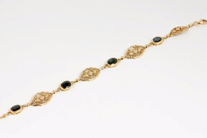 null Bracelet en or jaune 18k (750) ornée de saphirs. 

L. : 19 cm ; Poids brut :...