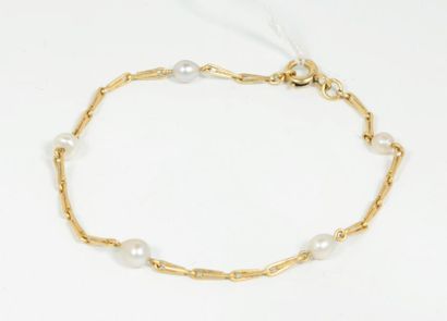 null Bracelet en or jaune 18k (750) avec des perles de culture

Poids brut : env...