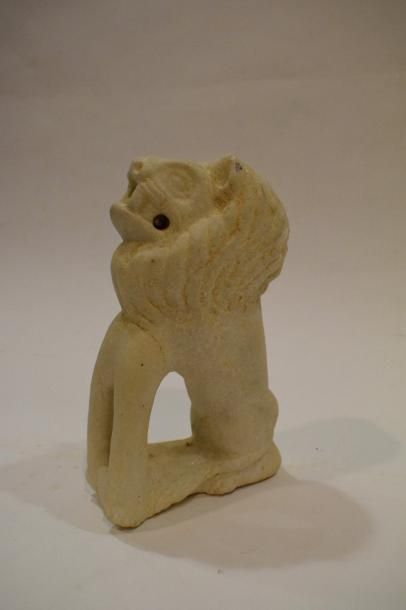 null Lion en marbre sculpté

Travail oriental

H. : 23cm