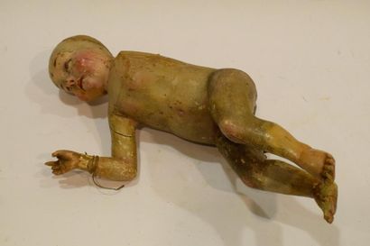 null Fragment de statue en bois sculpté polychrome représentant l'enfant jésus nu

Manques,...