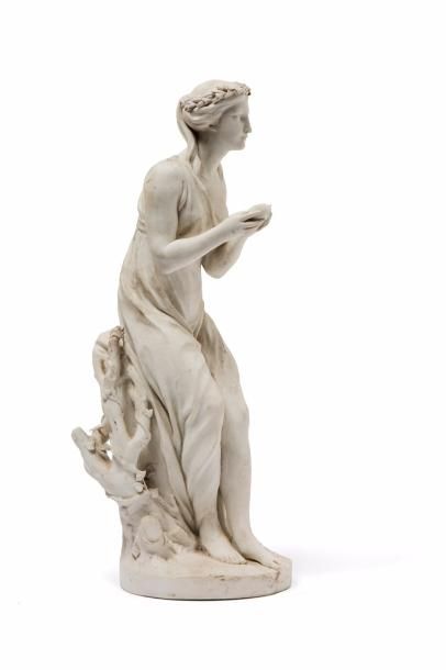 ANONYME XIXe siècle 
Femme tenant un coeur sculpture en biscuit (défauts de cuisson...