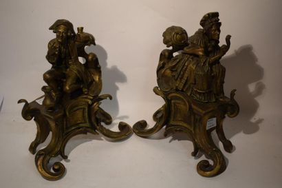 null Paire de chenets en bronze représentant un couple en habits du XVIIIème siècle...
