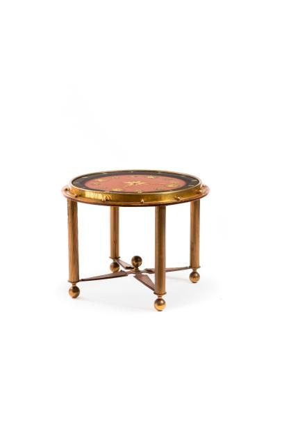null TRAVAIL FRANÇAIS 1940

Table basse en bois naturel vernissé et bronze doré à...