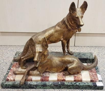 null ECOLE MODERNE

Deux chiens berger allemand

Bronze doré sur un socle en mar...
