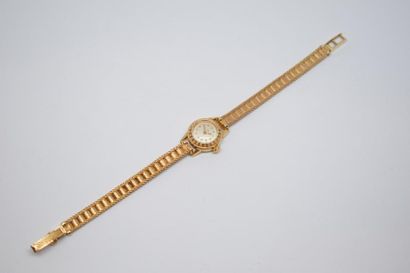 null Montre bracelet de dame mécanique en or jaune 18K (750) à boitier rond, le tour...