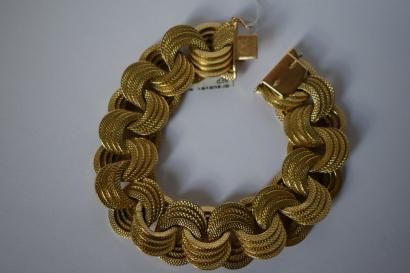 null Bracelet large articulé en or jaune 18K(750) à mailles rondes quadruples.

Lg...