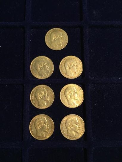 null [ Pièce en or ]

7 pièces de 20 francs Napoléon " tête nue " 1854 A. 

Poids...