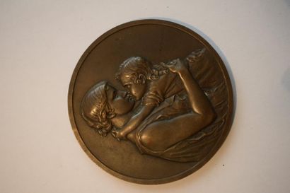null [ Médaille ] [ Prud'homme ]

Médaille en bronze de style Art Déco.

Sur l'avers...