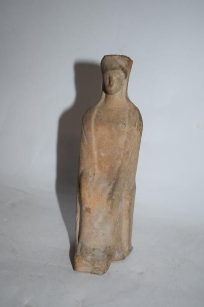 null Statuette de Koré en terre cuite
Grèce, Vème siècle av. J.C.
H. : 13,7 cm.
...