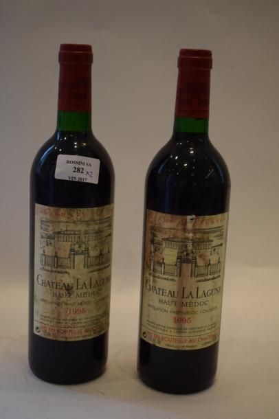 null 2 bouteilles CH. LA LAGUNE, 3° cru Haut-Médoc 1995 (ett)	


