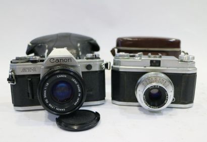 null Lot d'appareils : Canon AT-1, n°571937, objectif Canon Lens FD 1:1.8/50 mm,...