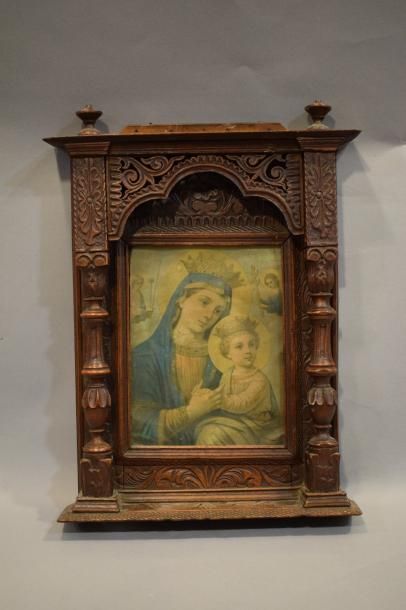 null Icône 

Vierge à l'enfant chromo lithographie dans un cadre en bois sculpté...