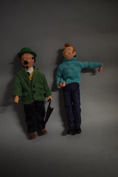 null [TINTIN]

Un lot composé d'une figurine Tintin en plastique (Acc) et d'une figurine...