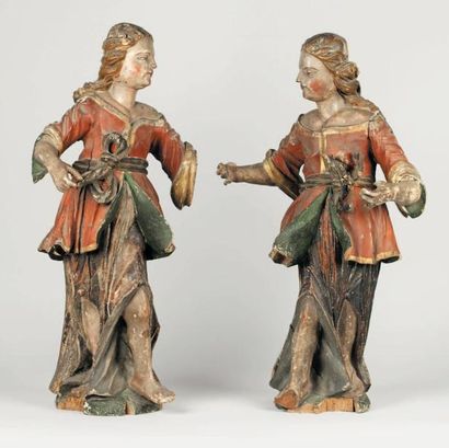 null Paire d'anges en bois sculpté et doré du milieu du XVIIIesiècle. Ils sont représentés...