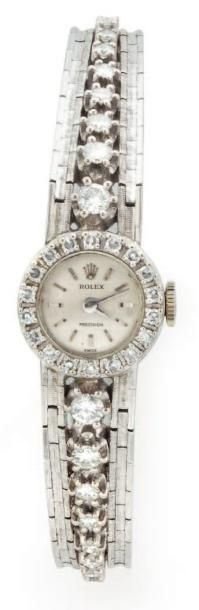 ROLEX vers 1960 Montre bracelet de dame ronde, diamètre:15mm, en or blanc 18K (750/1000e),...