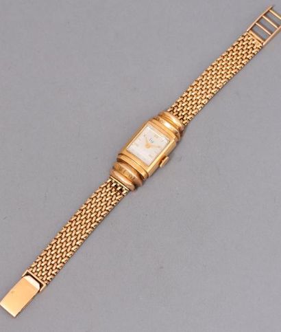 null LIP 

Montre bracelet de dame, boitier rectangulaire en or jaune 18k (750),...