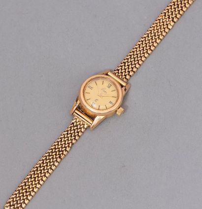 null Montre bracelet de dame en or jaune 18k (750), boitier rond, cadran à fond doré...