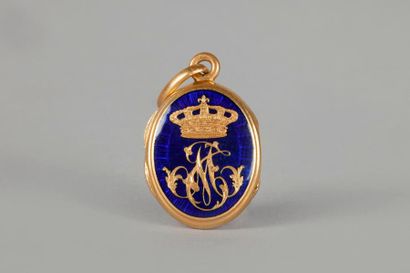 null Pendentif en or (18K) de forme ovale contenant une mèche de cheveux d'un membre...