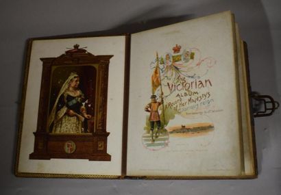 null The victorian album 

Boite à musique en forme d' album à pages lithographiées...