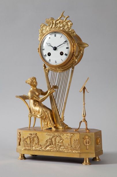 null Pendule "à la Harpiste"



en bronze doré reposant sur une base à décor d'une...