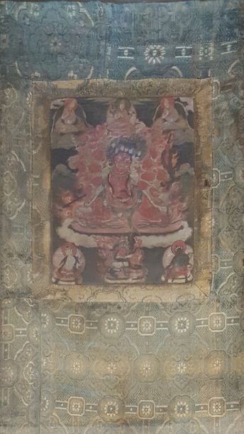 null PETIT THANGKA représentant Mahakala à six bras, debout,

piétinant des serpents,...