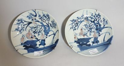 null CHINE. XIXÈME SIÈCLE

Paire d’assiettes en porcelaine à décor sous couverte,...