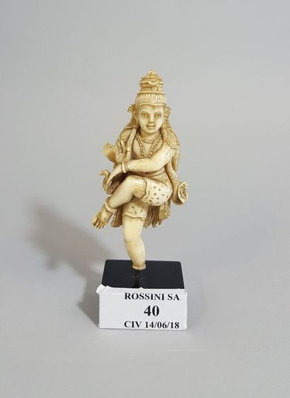 null PETIT SUJET EN IVOIRE représentant Shiva à quatre bras,

dansant sur un pied,...