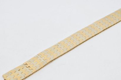 null Bracelet ruban souple en ors de couleur 18K (750) à décor géométrique (acc.)

Tour...