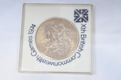 null [ Médaille ] 

Médaille commémorative des jeux du Commonwealth de 1974 en cupro-nickel.

Avers...