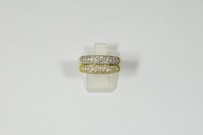 null Bague formée de deux joncs pavés de diamants en or jaune et gris 18k ( 750)

Poids...