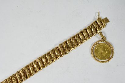 null Bracelet en or jaune 18k (750 à maille américaine orné d'un souverain en or...