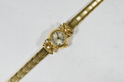 null Montre bracelet de dame, boîtier en or jaune 18k (750) orné de noeuds, cadran...