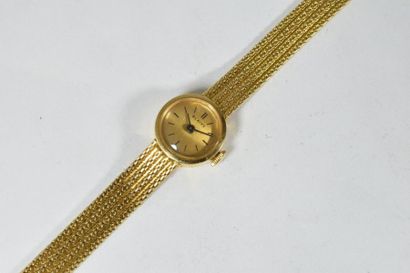 null Montre bracelet de dame en or jaune 18k (750), cadran rond à fond doré et index...
