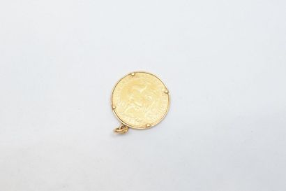 null Pièce en or de 20 francs au Coq (1910) 

Montée sur un pendentif en or jaune...