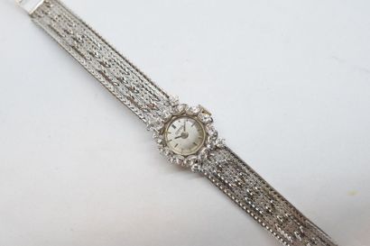 null Montre bracelet de dame en or gris 18k (750), boîtier rond, cadran à fond gris...