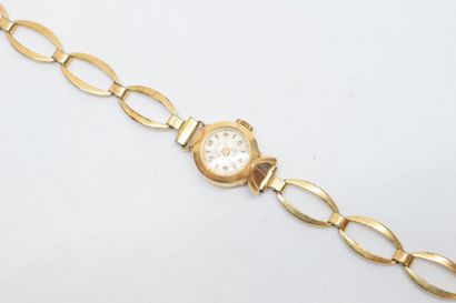 null Petite montre bracelet de dame, boîtier rond en or jaune 18k (750) et bracelet...