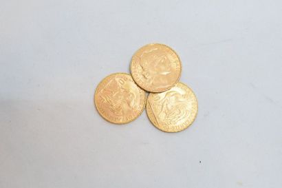 Trois pièces en or de 20 francs 