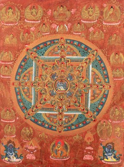 null Thangka peinte à l'or et couleurs sur fond rouge représentant le mandala de...