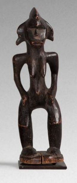 null Statuette Senoufo, Côte d'Ivoire. 

Statuette féminine en bois à patine brun...