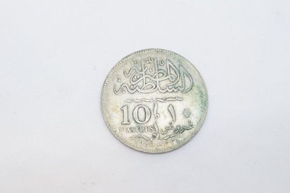 null Pièce en argent de 100 piastres " Fuad I " 1920. Egypte.

Usure. 

Poids : 14...