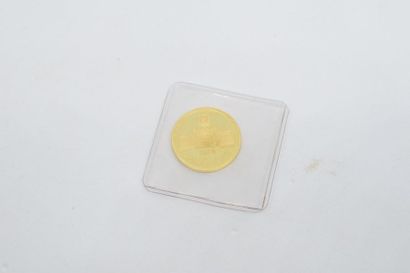 null Pièce en or jaune (900) iranienne commémorative. 

Poids brut (fermée sous blister)...